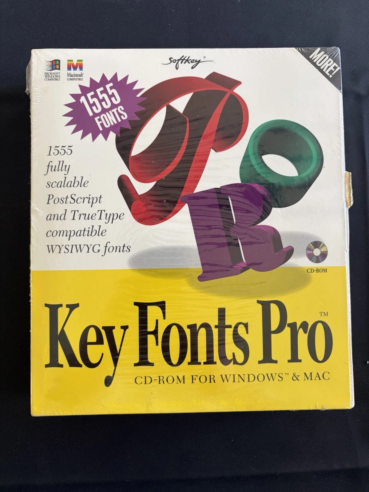 The sealed retail box for Key Fonts Pro, promising 1,555 fonts on the starburst.